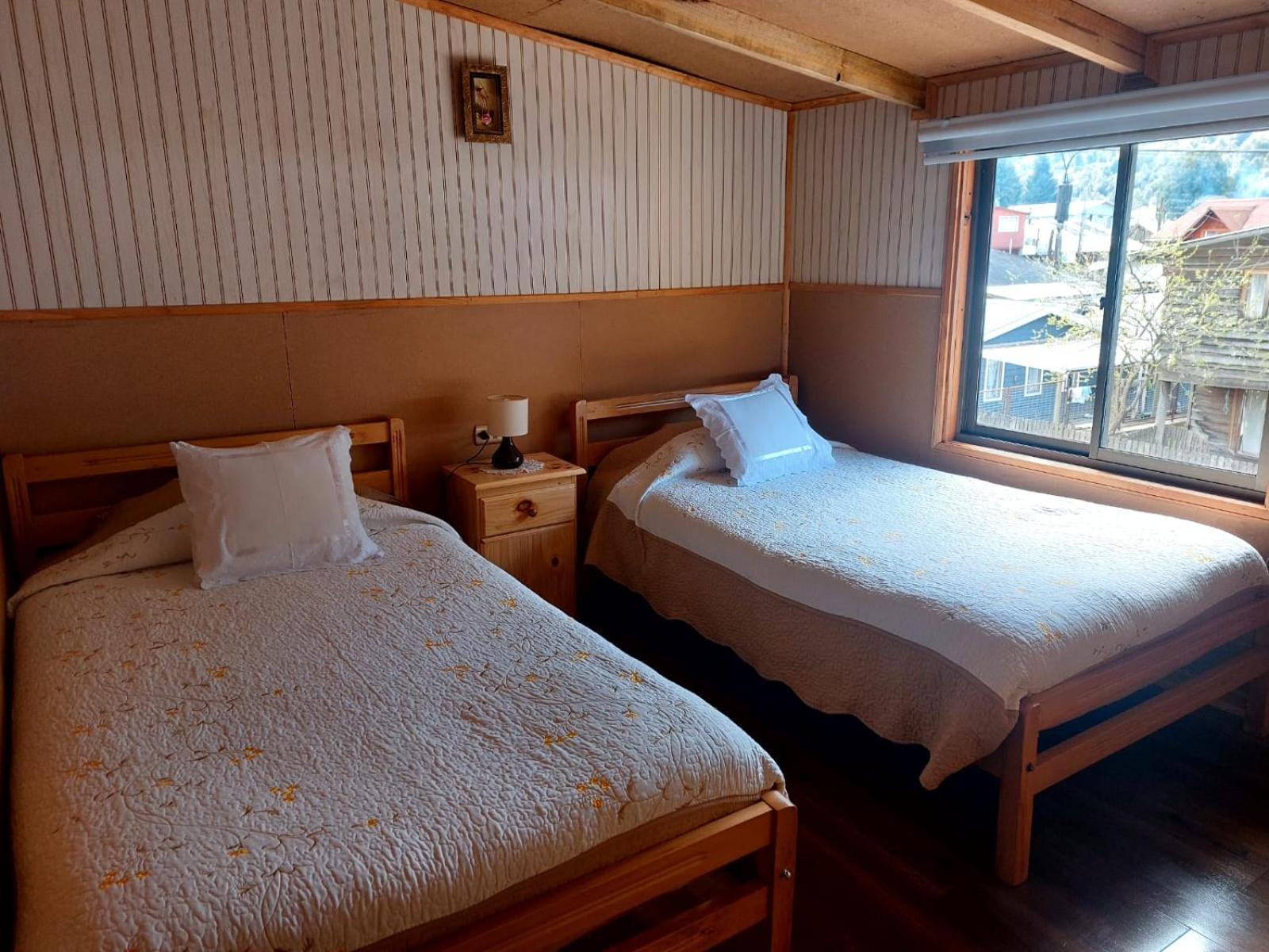 Hostal Y Cabanas Ventisquero プエルト・プユワピ エクステリア 写真