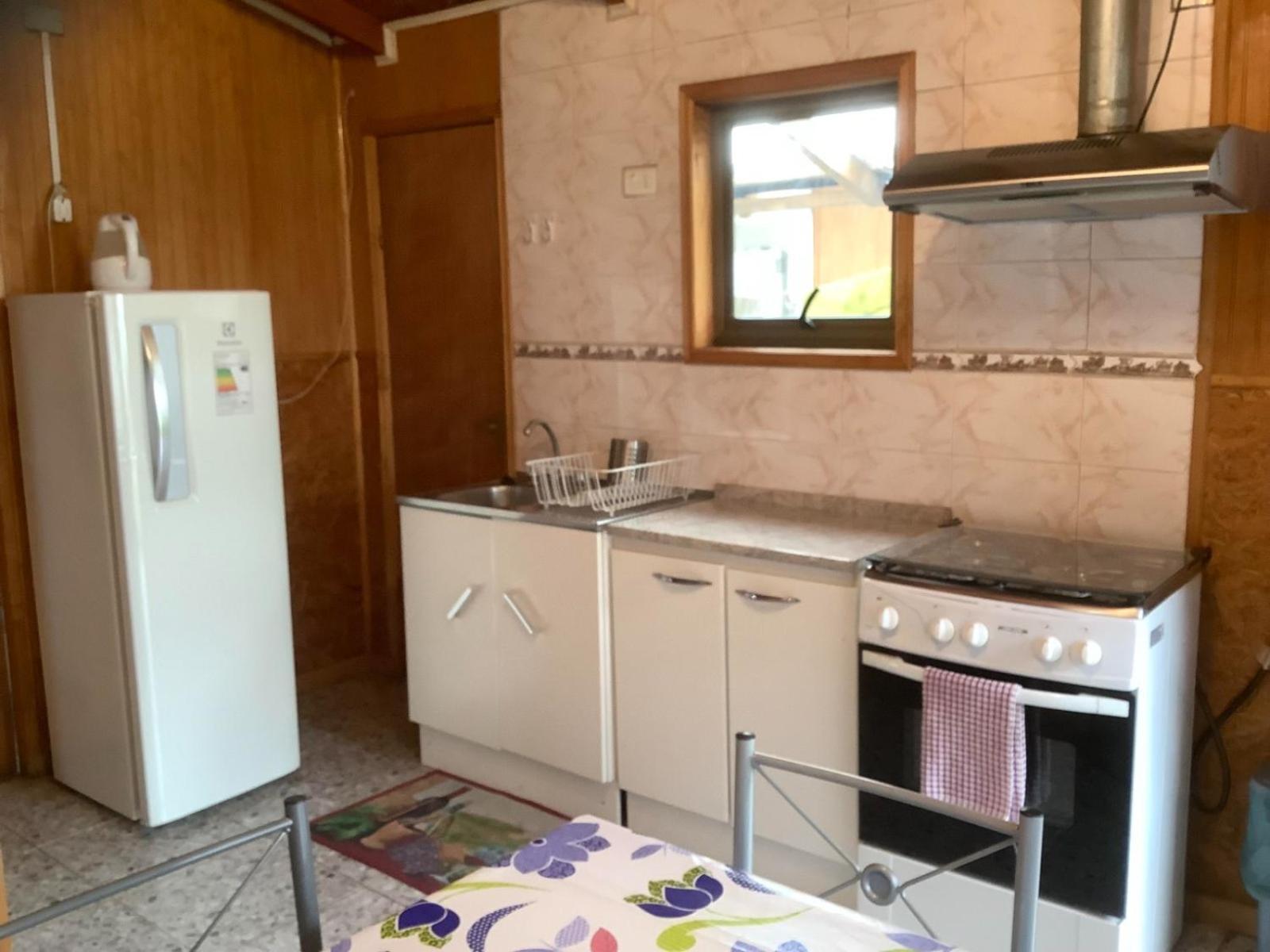 Hostal Y Cabanas Ventisquero プエルト・プユワピ エクステリア 写真